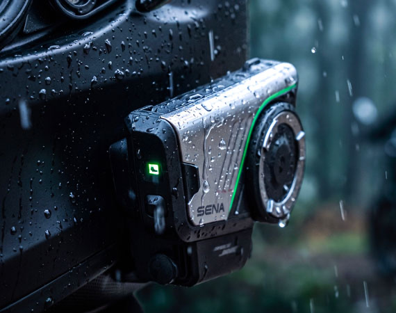 A Sena 60S EVO intercom fitted to a helmet in the rain